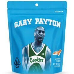 Close-up of frosty Gary Payton Cookies Strain buds in jar with Moonrock logo