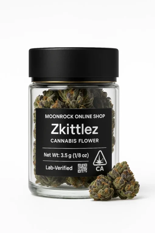 Zkittlez — fruity indica hybrid. Lab-verified 23–25% THC. Fresh-sealed, CA-compliant, discreet California delivery. Zkittlez cannabis flower in a clear jar with matte black lid, front label showing Net Wt 3.5 g and CA THC symbol, with two frosty buds displayed on pure white — Moonrock Online Shop.