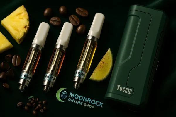 Three Moonrock Clear Cartridges on dark green velvet: Clear Sky Hybrid, Midnight Kush Indica, Solar Flare Sativa with Yocan battery