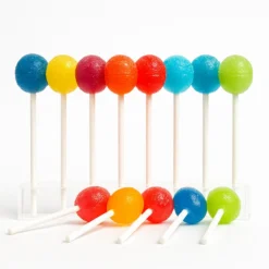 THC Lollipops (10mg) – lab-tested cannabis lollipops in assorted flavors on a pure white background – Moonrock Online Shop