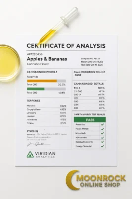 Apples and Bananas strain cannabis buds and labeled jar beside COA lab report marked PASS with Moonrock Online Shop logo, pipettes, and vials on white background
