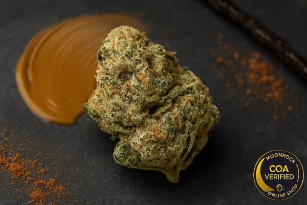 Buy Peanut Butter Breath strain online hero image showing frosty buds with peanut, cocoa, and vanilla accents