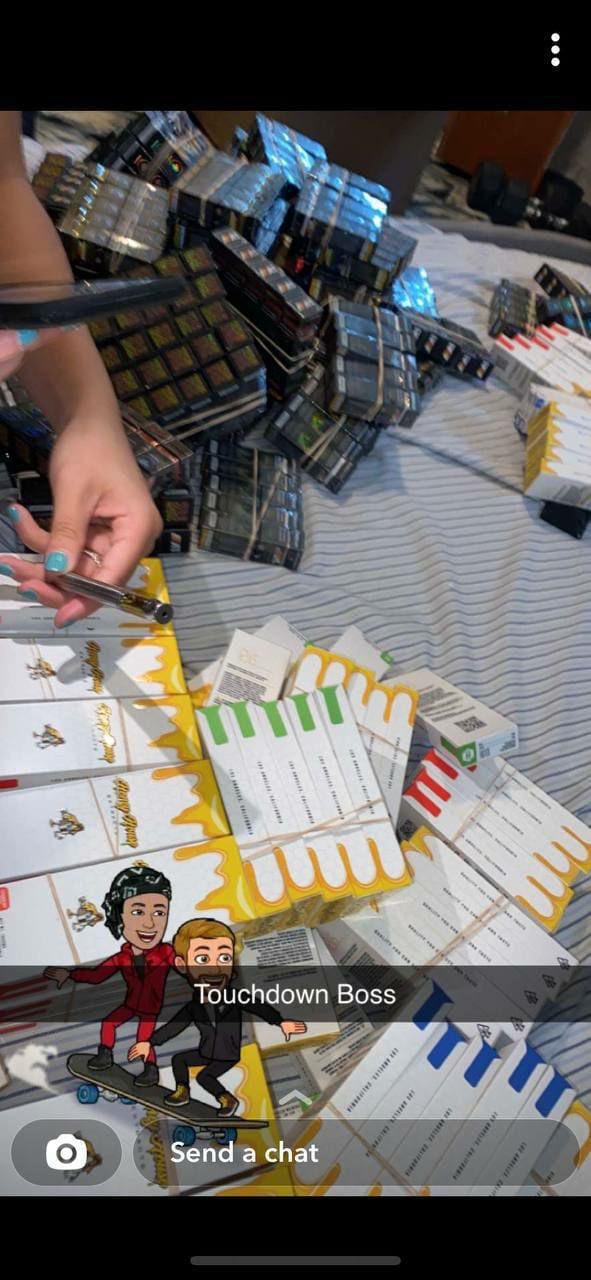 Bulk vape inventory being sorted and verified — large wholesale shipment ready for packaging and dispatch to legal regions.